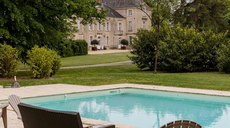 Vue de la piscine de l'hôtel Cop Choux